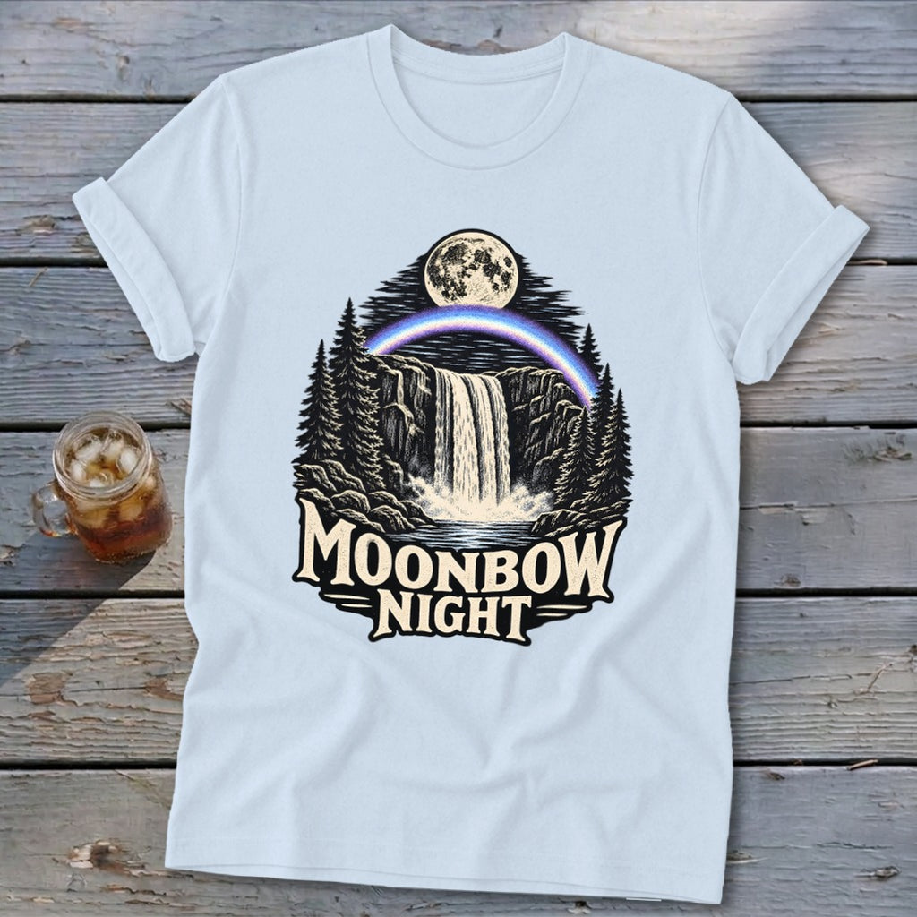 Light blue t-shirt with "Moonbow Night" text over a waterfall, moon, and rainbow graphic.