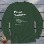 Dark green long-sleeve shirt with "Plumb Tuckeradjective" definition.
