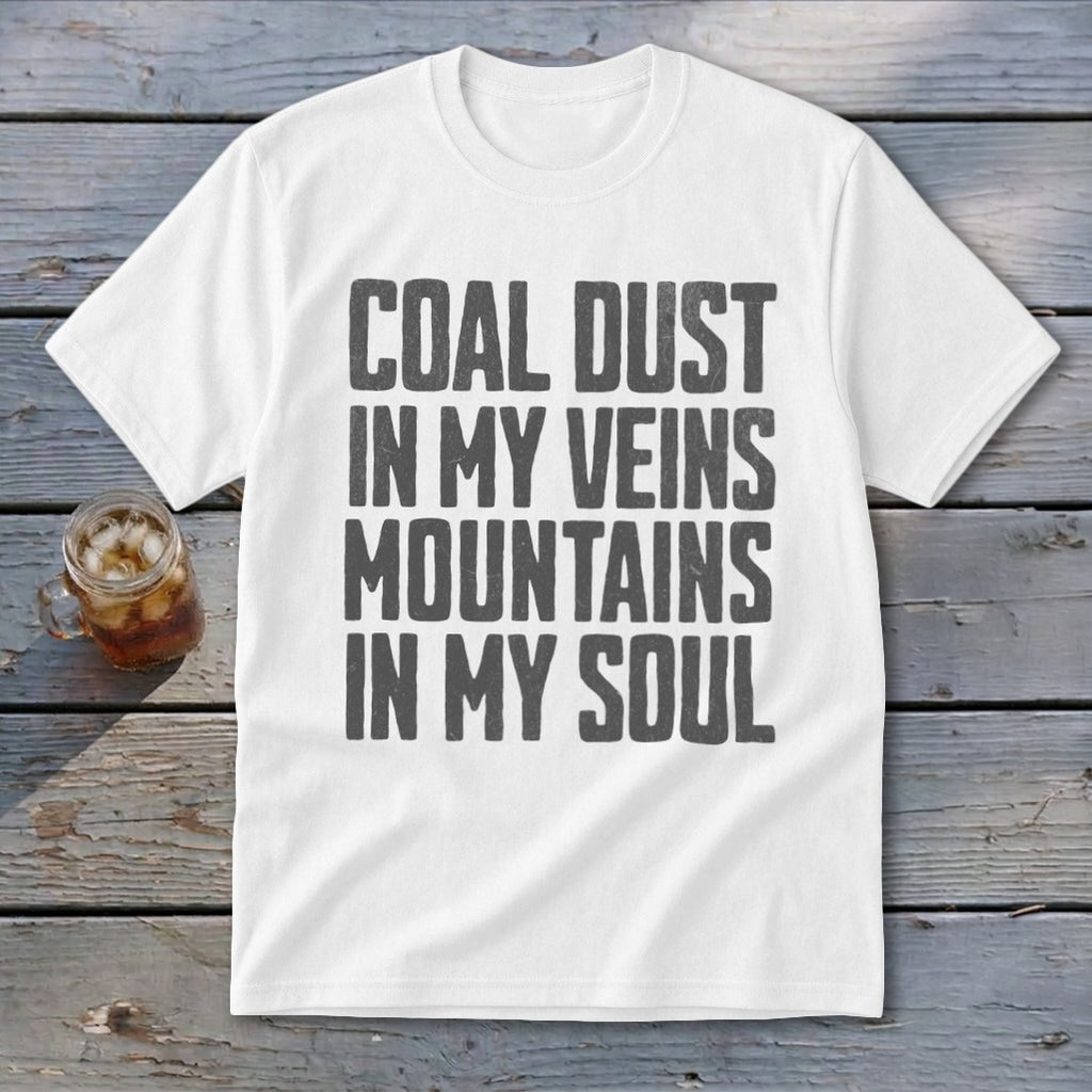 White t-shirt with grey distressed text reading COAL DUST IN MY VEINS MOUNTAINS IN MY SOUL.