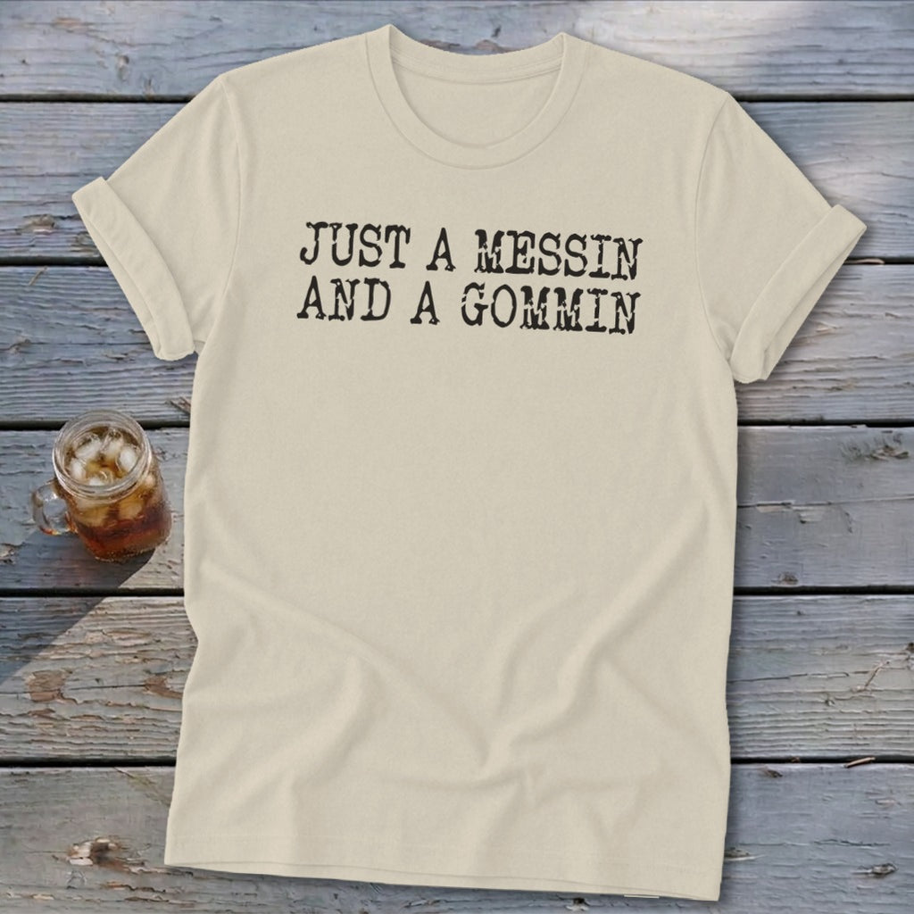 Cream t-shirt with black text that reads "JUST A MESSIN AND A GOMMIN".