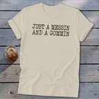 Cream t-shirt with black text that reads "JUST A MESSIN AND A GOMMIN".