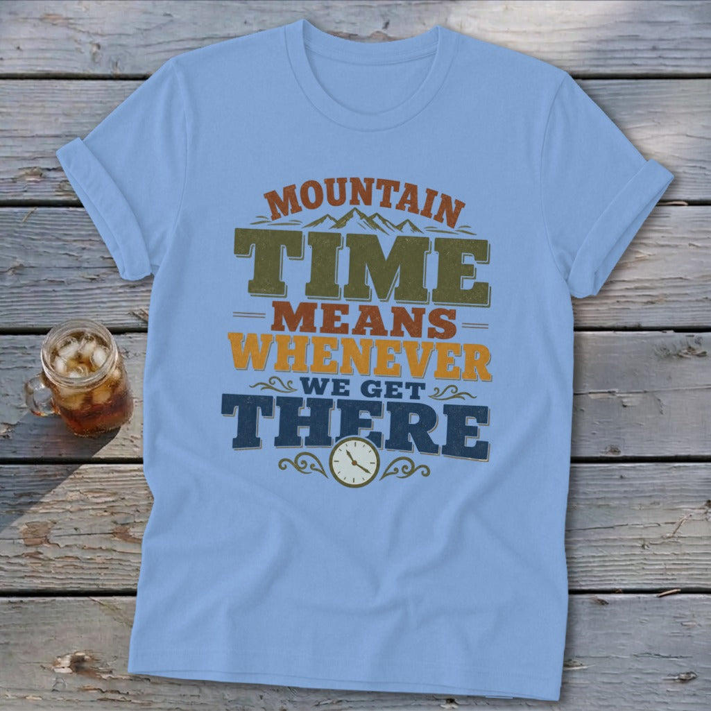 Light blue t-shirt with "Mountain Time Means Whenever We Get There" text and clock graphic.