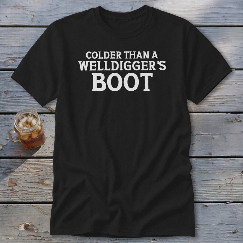 Black t-shirt with white text "Colder Than A Welldigger's Boot".