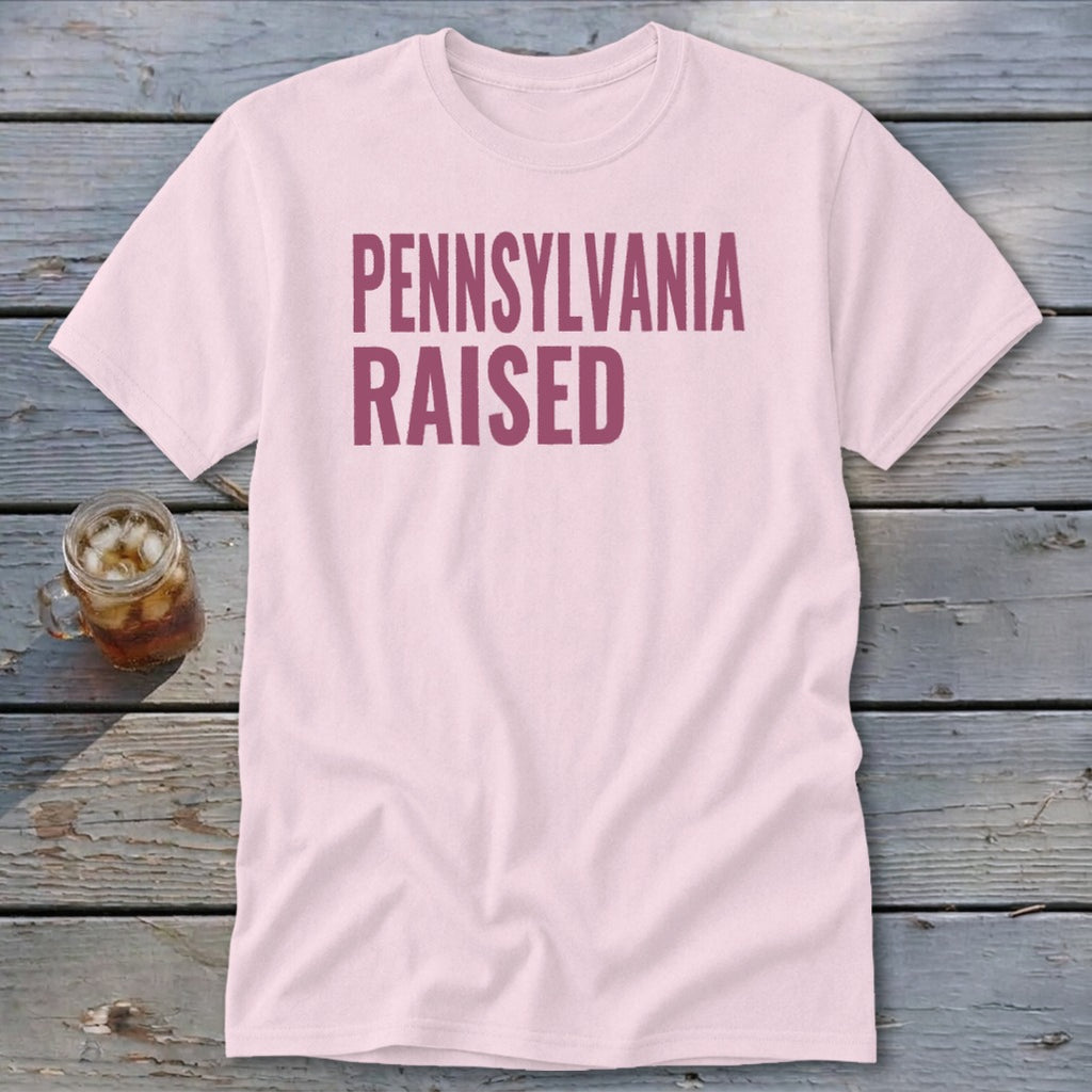 Light pink t-shirt with "PENNSYLVANIA RAISED" text in burgundy.