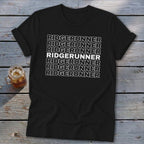 A black t-shirt with rolled-up sleeves features the word RIDGERUNNER repeatedly in white block letters.