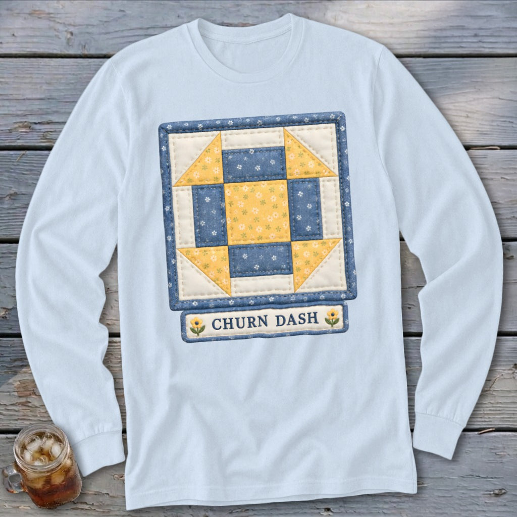 Light blue long-sleeve shirt with a blue and yellow quilt block graphic and "CHURN DASH" text.