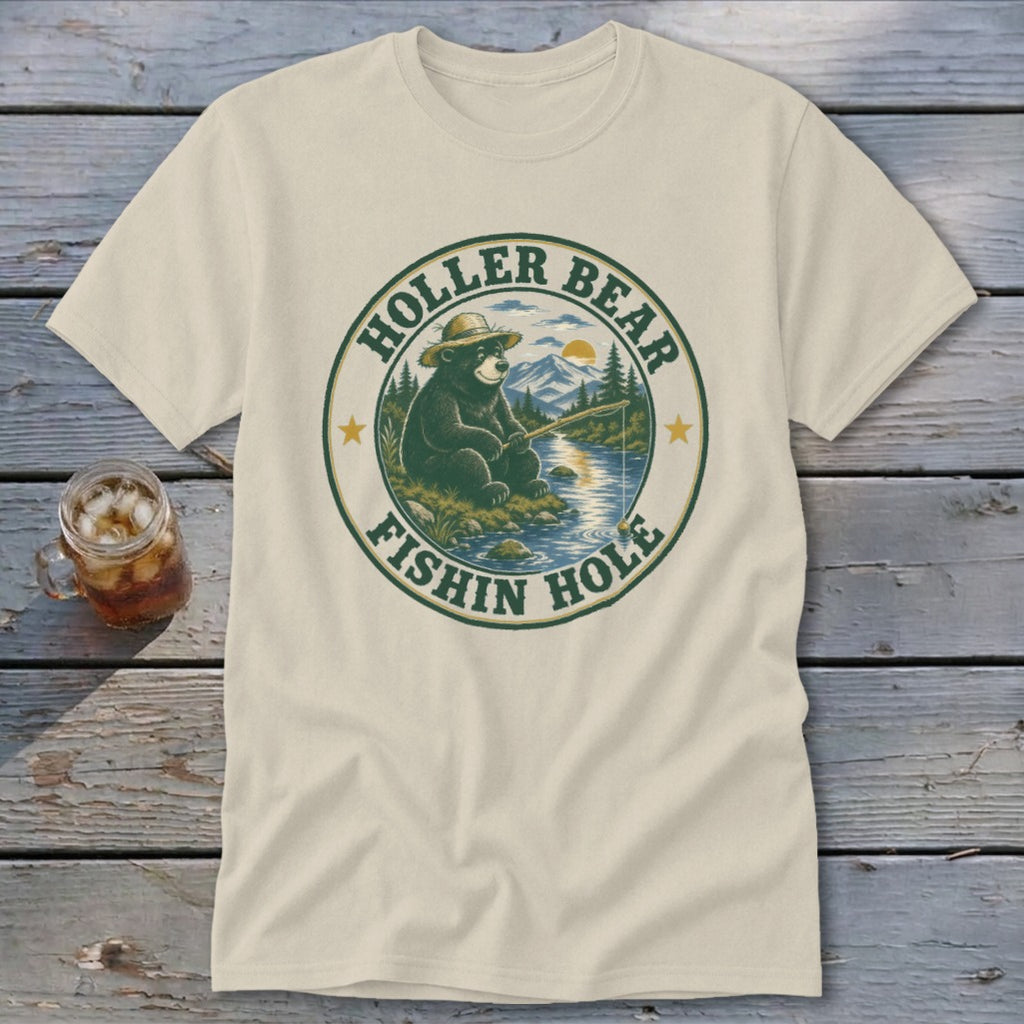 Cream t-shirt with "Holler Bear Fishin Hole" graphic of bear fishing by a river.