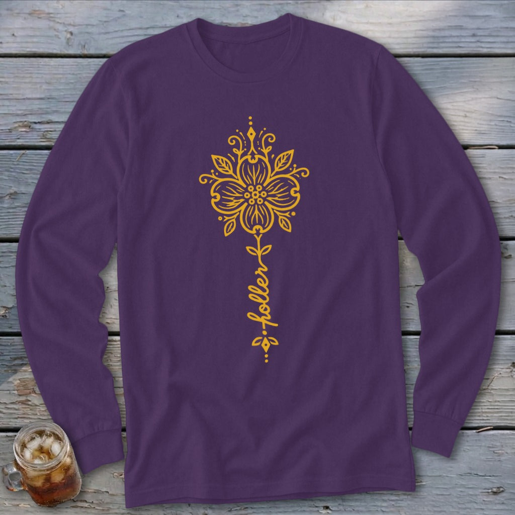 Purple long sleeve shirt with a yellow floral design and "holler" text.