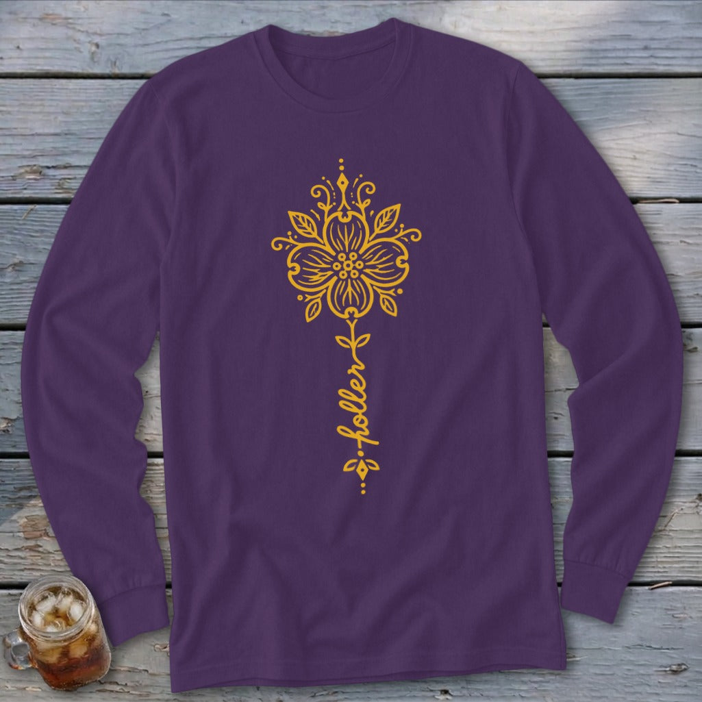 Purple long sleeve shirt with a yellow floral design and "holler" text.