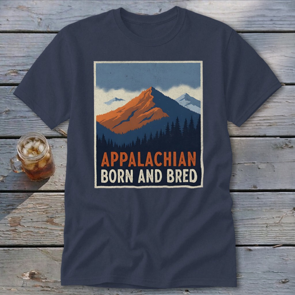 A dark blue t-shirt featuring a retro graphic of mountains, trees, and the text Appalachian Born and Bred.