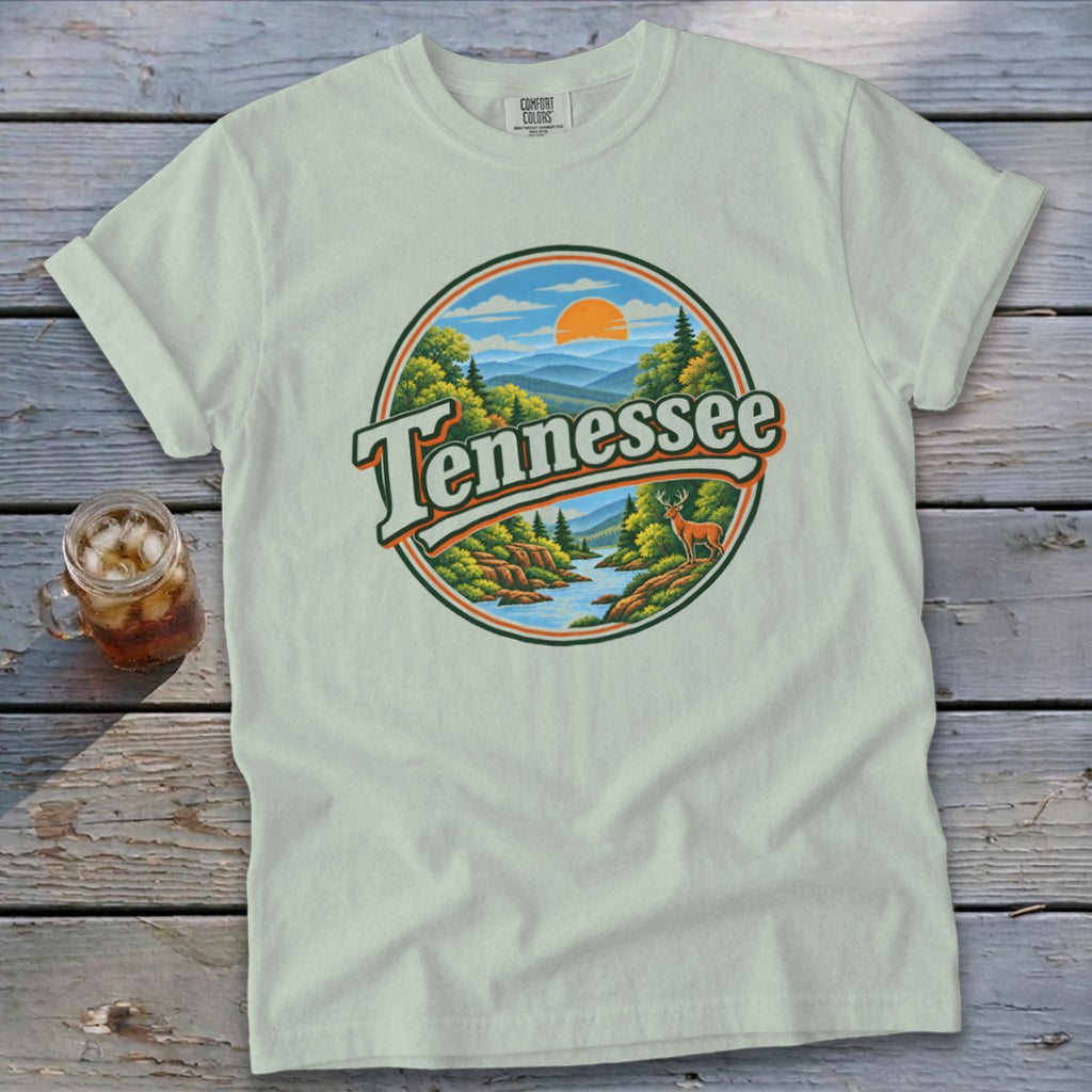 Light green t-shirt with circular Tennessee landscape graphic and deer.