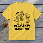Yellow t-shirt with black graphic of three people flat-foot dancing and text "FLAT-FOOT DANCING".