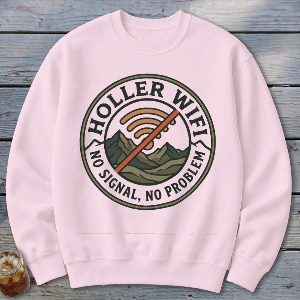 Pink sweatshirt with circular graphic featuring mountains, no wifi symbol, and text "Holler Wifi No Signal, No Problem."