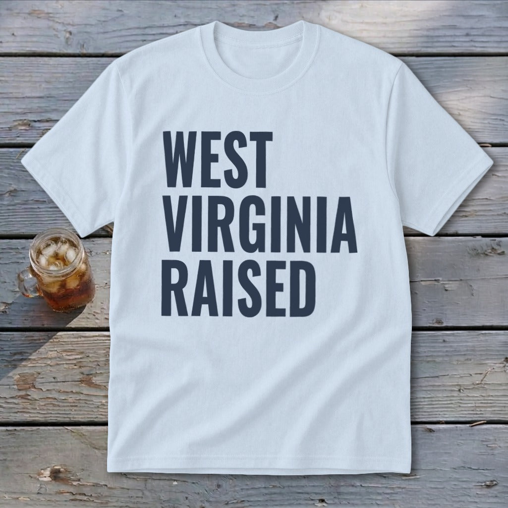 Light blue t-shirt with "WEST VIRGINIA RAISED" in dark blue text.