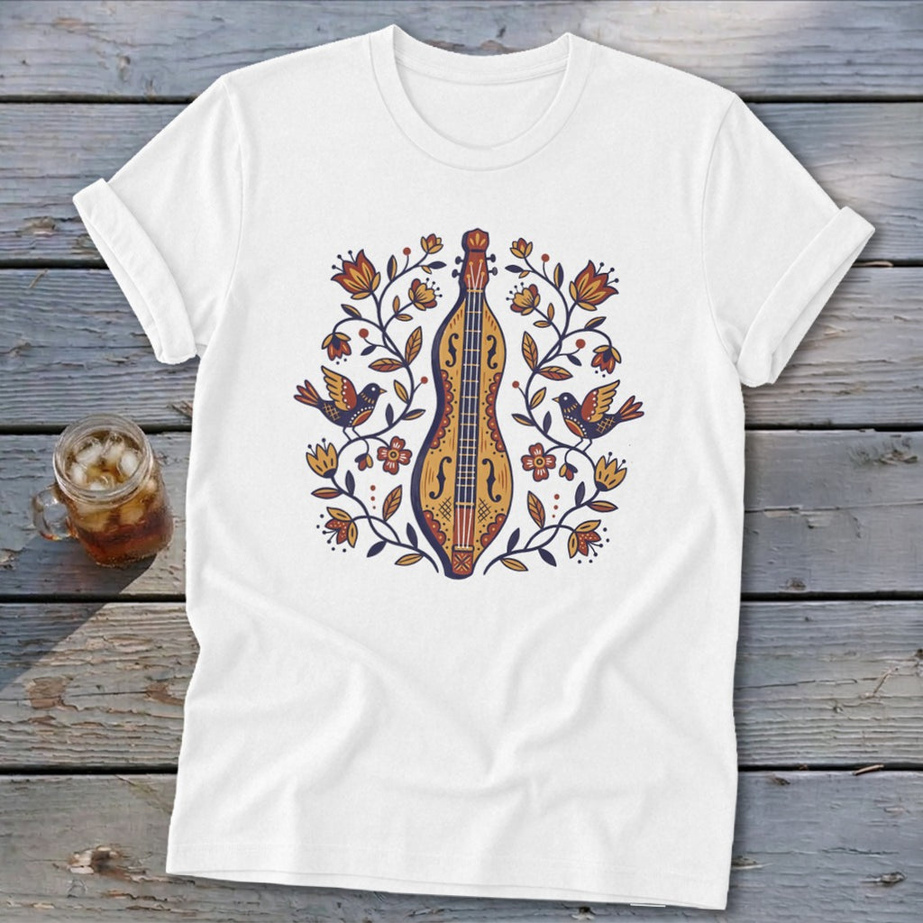 White t-shirt with a folk art illustration of a dulcimer, flowers, and birds.