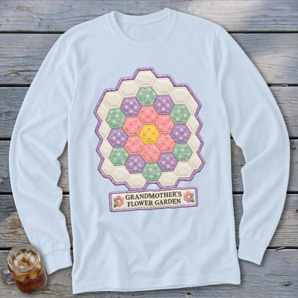 Light blue long-sleeve shirt with a hexagonal quilt design and text "GRANDMOTHER'S FLOWER GARDEN."