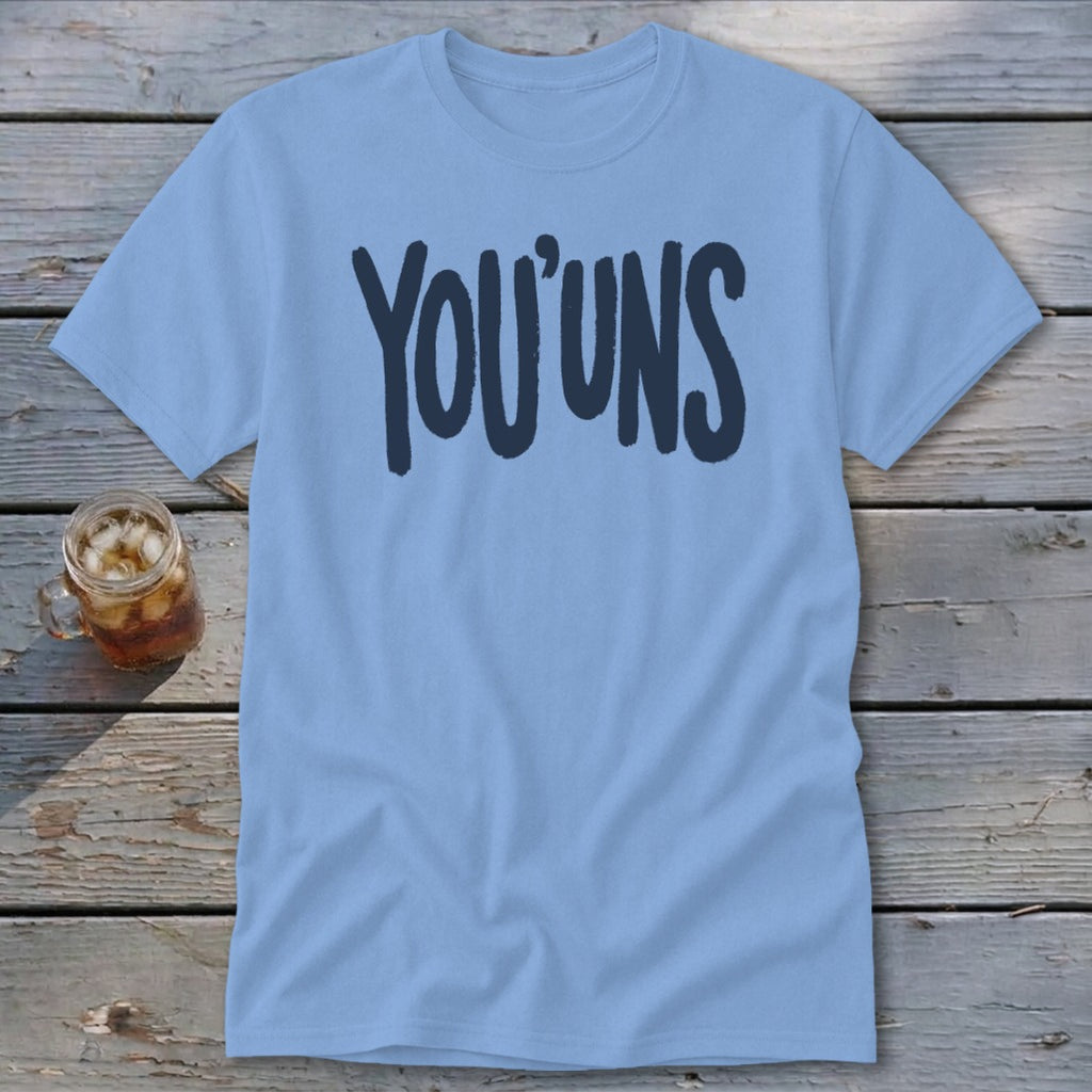 Light blue t-shirt with "YOU'UNS" in dark blue text and a glass of iced tea.