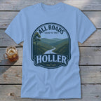 Light blue t-shirt with "All Roads Lead to the Holler" scenic road graphic.