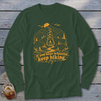 Dark green long sleeve shirt with orange hiking graphic and text.