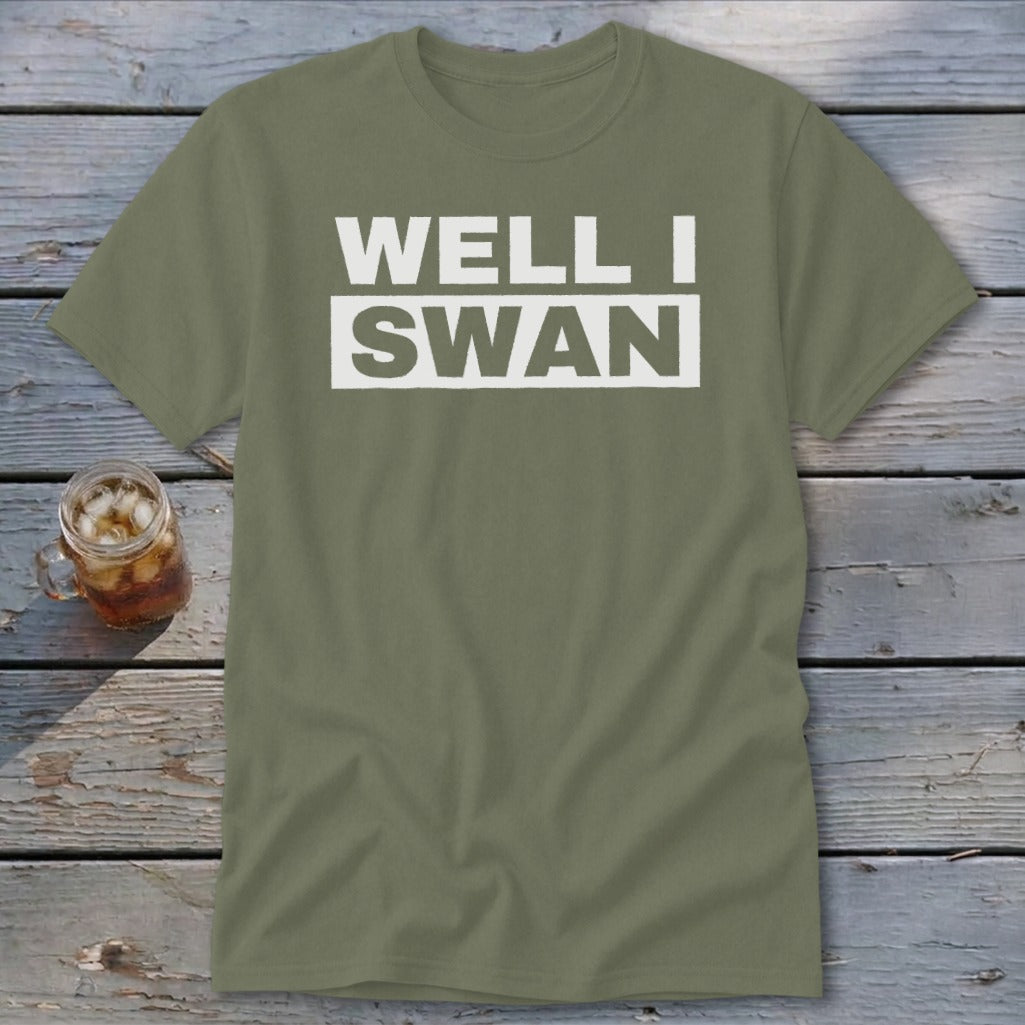 Olive green short-sleeved t-shirt with the text WELL I SWAN printed in white across the chest.