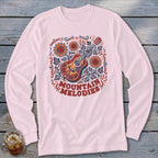 Light pink long-sleeved shirt with a folk art guitar graphic surrounded by sunflowers and the text Mountain Melodies.