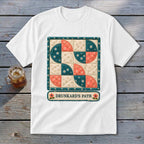 White t-shirt with a patchwork quilt design and "Drunkard's Path" text.