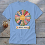 Light blue t-shirt with a Dresden Plate quilt flower graphic and "DRESDEN PLATE" text.