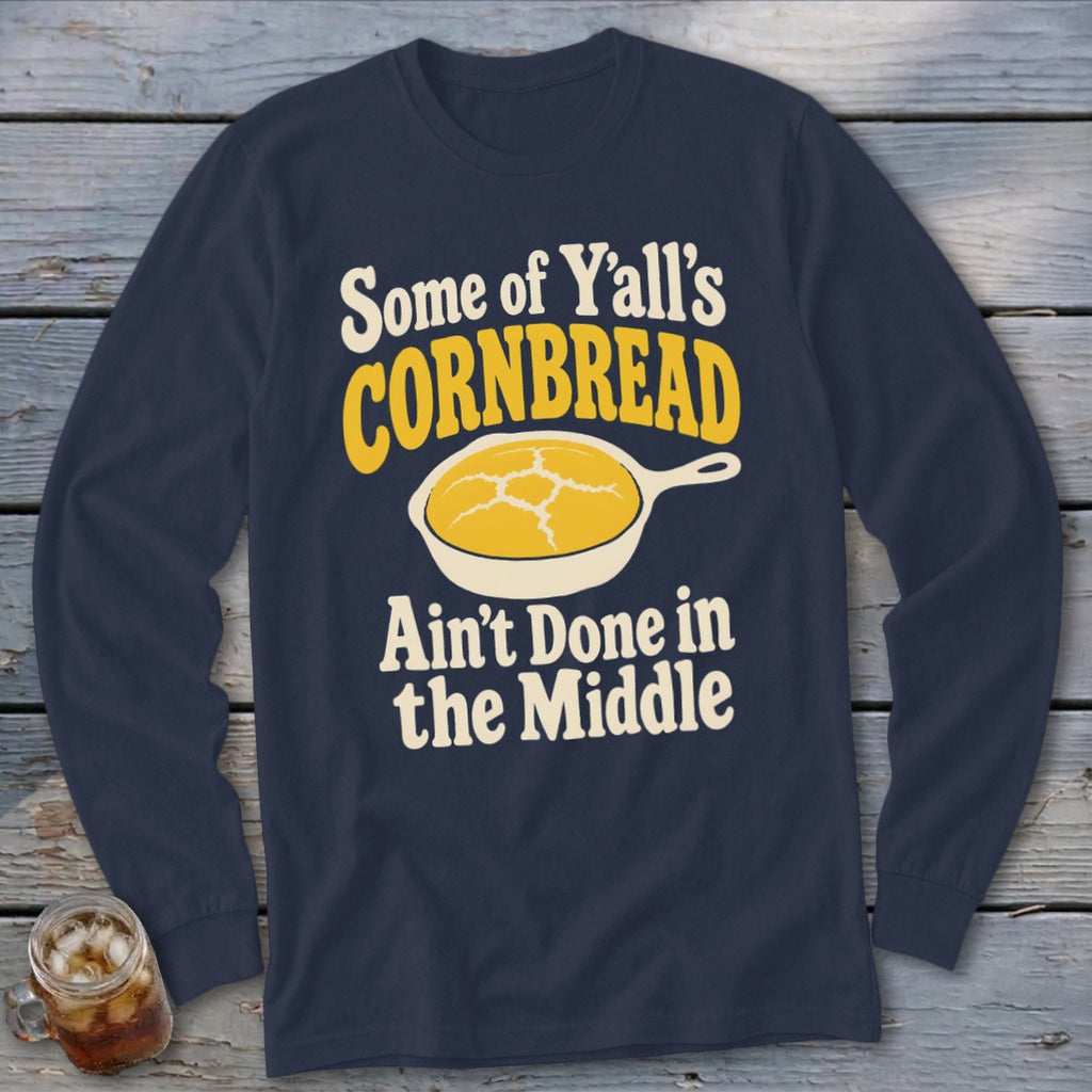 Dark blue long-sleeve t-shirt with a vintage graphic and text that reads Some of Y'all's Cornbread Ain't Done in the Middle.
