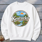 White sweatshirt featuring a circular graphic of Kentucky scenery with a deer.
