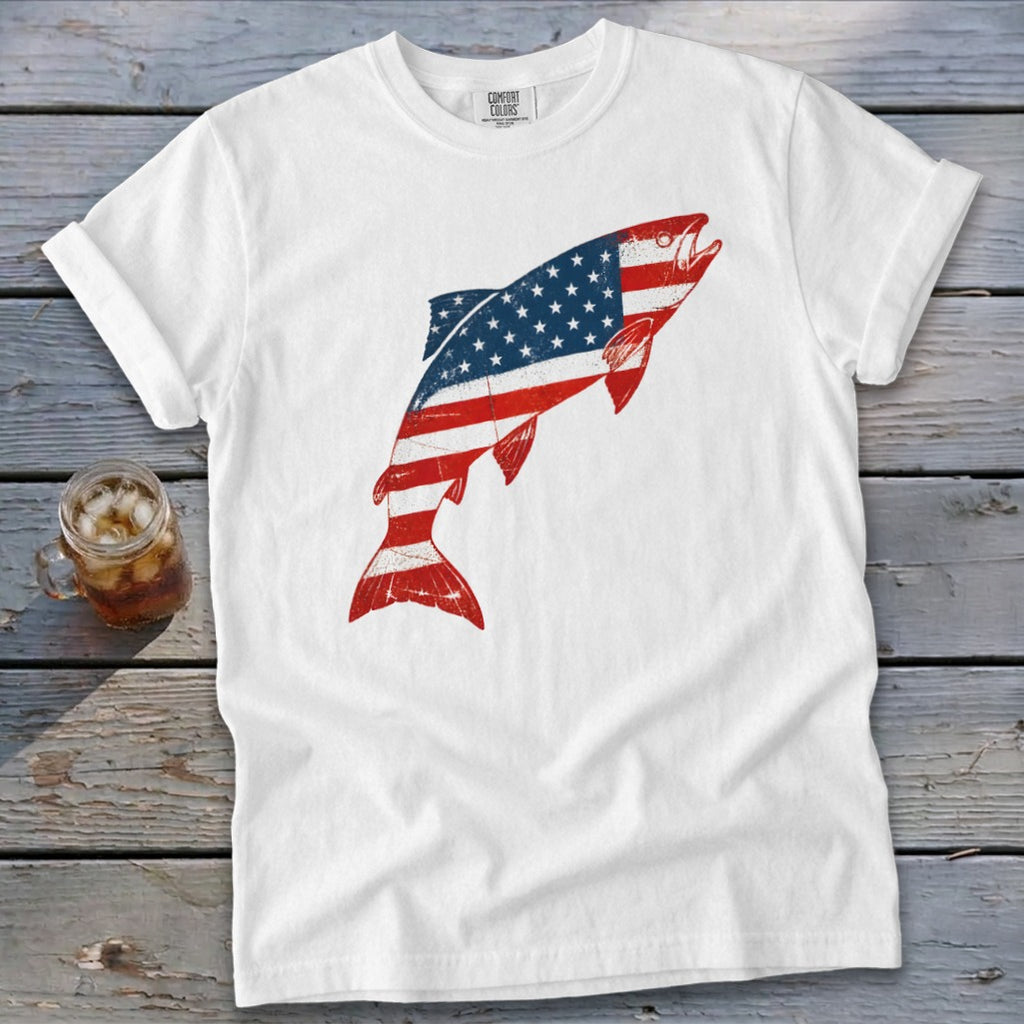A white crewneck t-shirt featuring a leaping fish graphic patterned with the American flag.