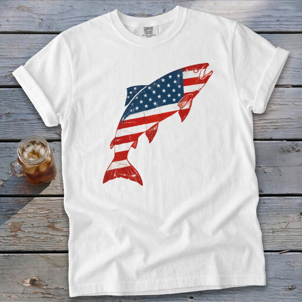 A white crewneck t-shirt featuring a leaping fish graphic patterned with the American flag.