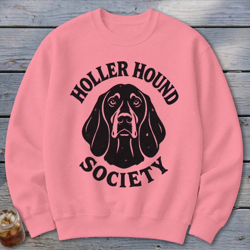 Pink sweatshirt with black "Holler Hound Society" text and dog graphic.