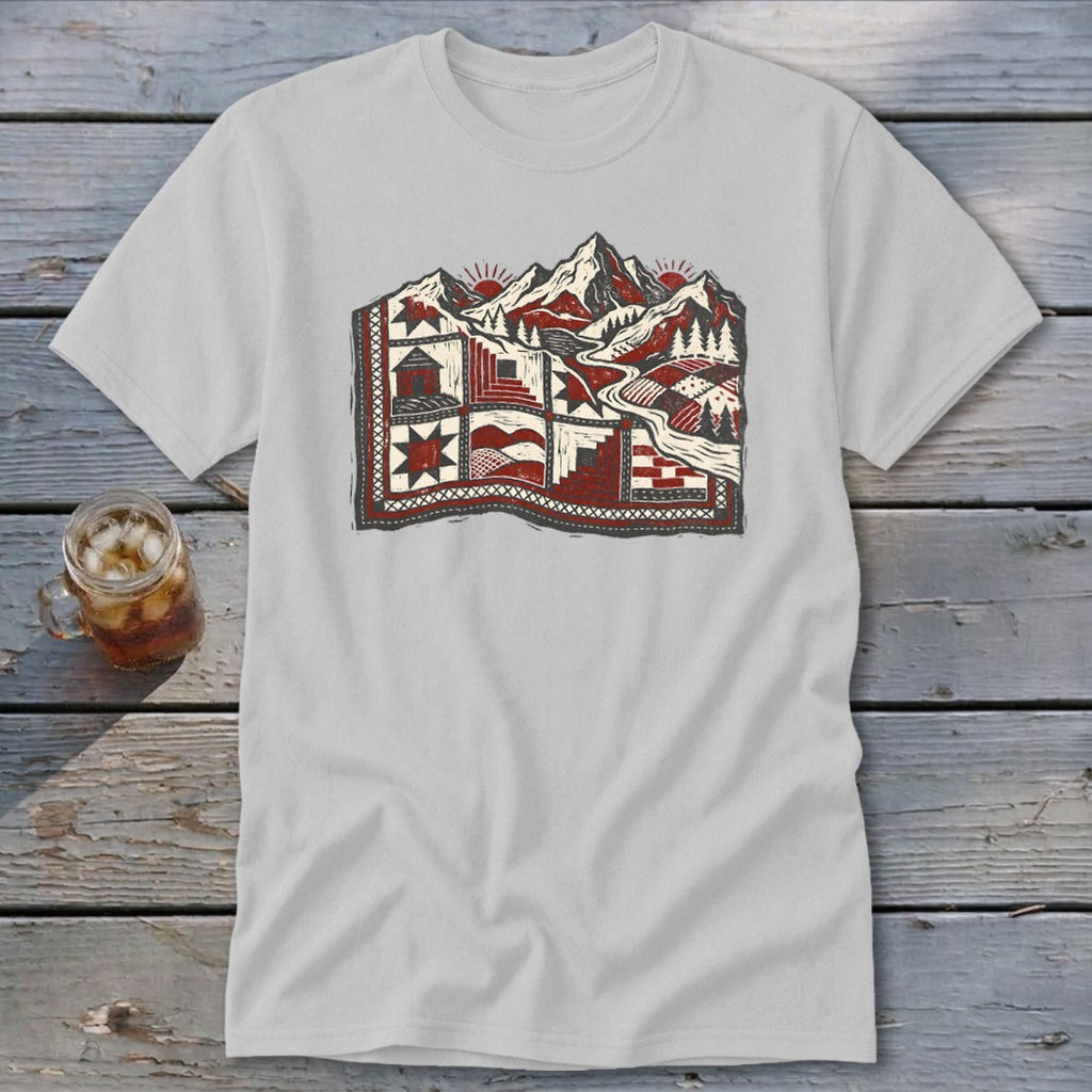 Light gray t-shirt featuring a red, black, and white quilt graphic with mountain landscape scenery.