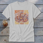 Light gray t-shirt with a graphic of a fox playing a banjo, text "Mountain Soul" and "Front Porch Pickin'".