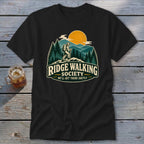 Black t-shirt with "Ridge Walking Society" design featuring a hiker and mountain landscape.