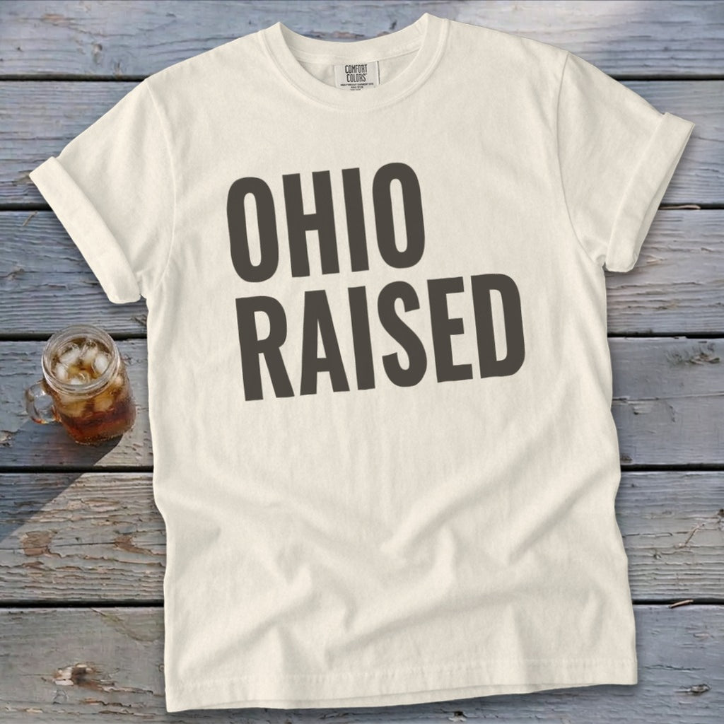 Cream t-shirt with "Ohio Raised" text in dark grey.