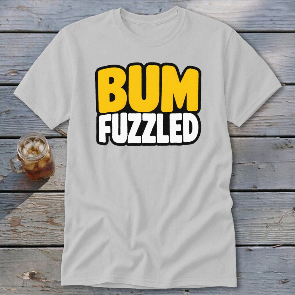 A light gray t-shirt with the words BUM FUZZLED printed in bold, yellow and white letters.