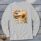 Long sleeve shirt with "Small Town Fall Vibes" graphic featuring a water tower and sunflower.