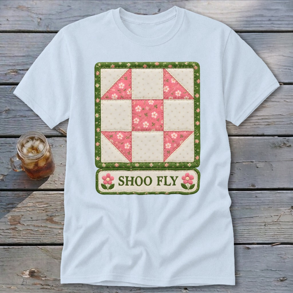 Light blue t-shirt with a Shoo Fly quilt block design and text.