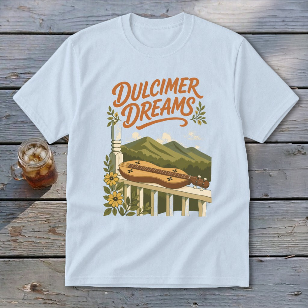 Light blue t-shirt with "Dulcimer Dreams" text and dulcimer on a porch railing.
