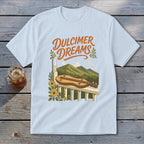 Light blue t-shirt with "Dulcimer Dreams" text and dulcimer on a porch railing.