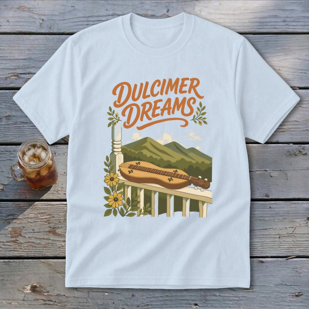 Light blue t-shirt with "Dulcimer Dreams" text and dulcimer on a porch railing.