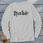 White long-sleeve shirt with black "Up-uz-Under" text graphic.