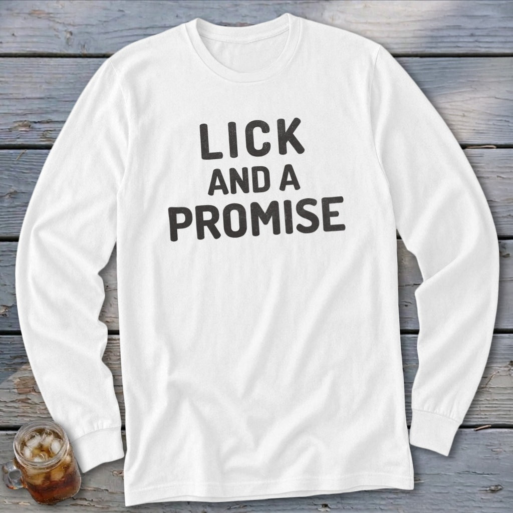 White long-sleeve shirt with black text that reads "LICK AND A PROMISE".