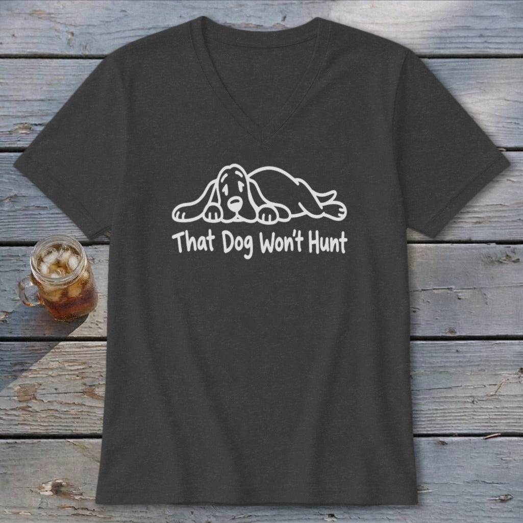 Dark grey V-neck t-shirt featuring a white graphic of a sleeping hound dog and the text That Dog Won't Hunt.
