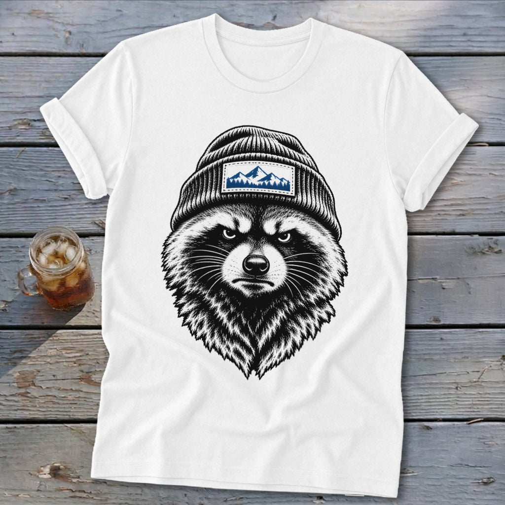 White t-shirt with illustration of a raccoon wearing a beanie with a mountain patch.