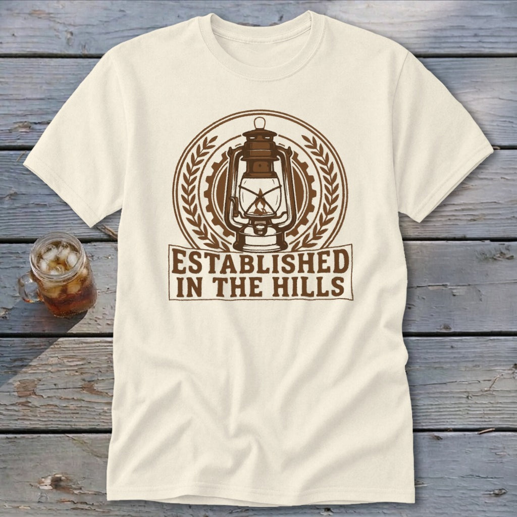 Cream t-shirt with brown lantern logo and text "Established in the Hills".
