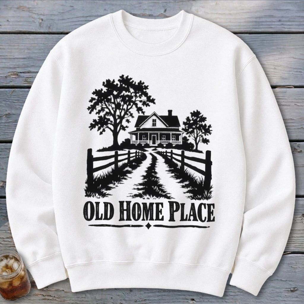 White sweatshirt with black graphic of a farmhouse and "Old Home Place" text.