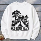 White sweatshirt with black graphic of a farmhouse and "Old Home Place" text.