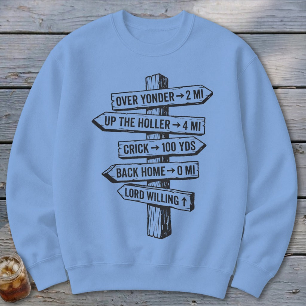 Light blue crewneck sweatshirt featuring a black graphic of a rustic wooden signpost with directional text.